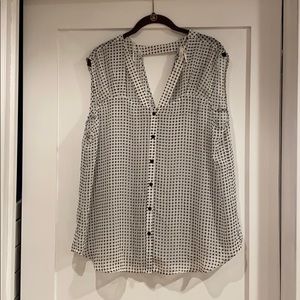 Sheer blouse with key hole detail.